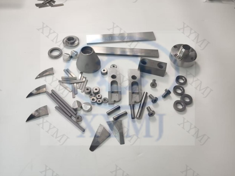 Why is cemented carbide an essential material for wear-resistant valves?